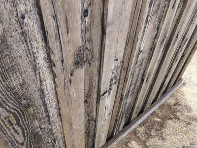 Reclaimed cedar fencing, panels are 6x7-8. Board over board
