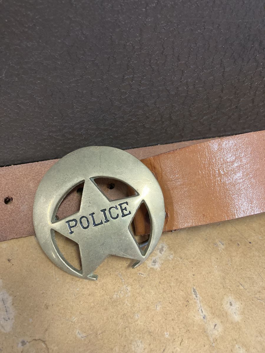 Brass belt buckle. Police
