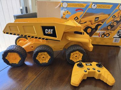 CAT Remote Control Motorized Dumping RC Dump Truck Toy