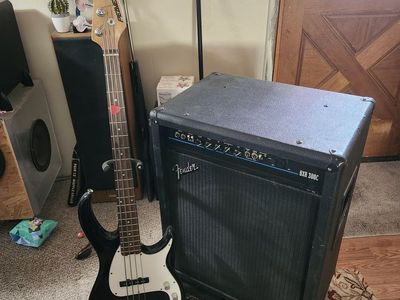 Peavey bass guitar and Fender BXR 300 c 18 inch sub