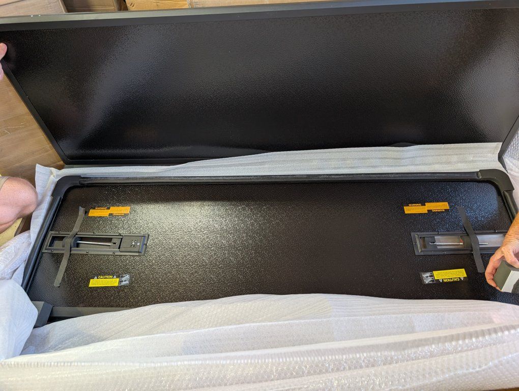 New Black Truck Bed Tonneau Cover, Hard Folding, Unused in Packaging