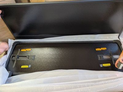 New Black Truck Bed Tonneau Cover, Hard Folding, Unused in Packaging