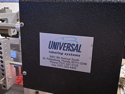 Universal Labeling Systems Labeler Machine - Industrial Labeling Equipment