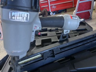 Porter-Cable Pneumatic Framing Nailer with Case and box of nails. Combination