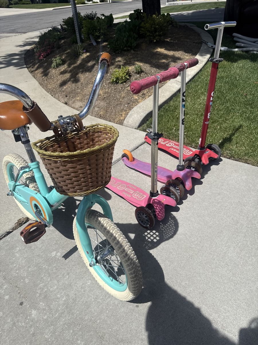 3 micro scooters and toddler bike