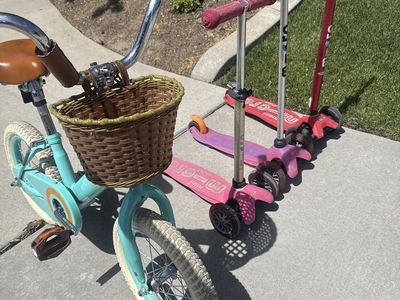 3 micro scooters and toddler bike