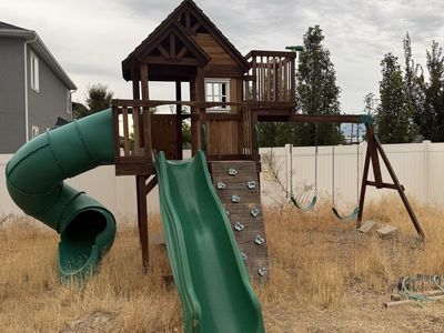 Wooden Backyard Playground Set with Slides, Swings, and Climbing Wall