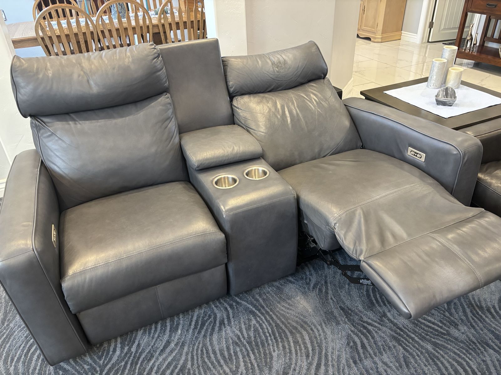 Dual leather recliner loveseat