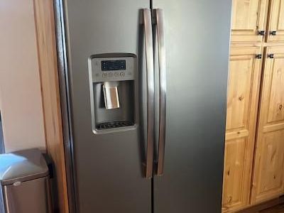 GE side-by-side, slate color refrigerator for sale