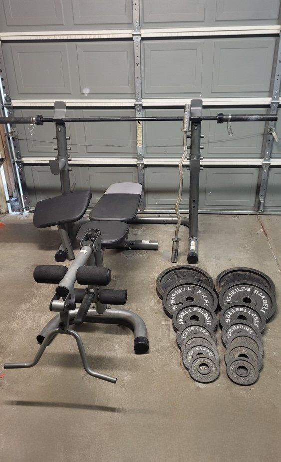 Bench and 255 pounds of weights