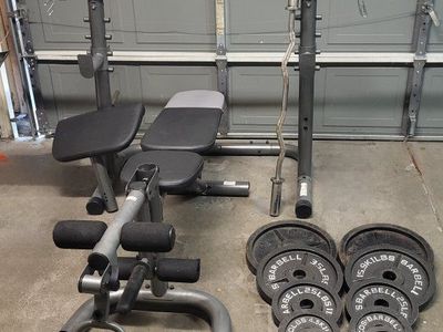 Bench and 255 pounds of weights