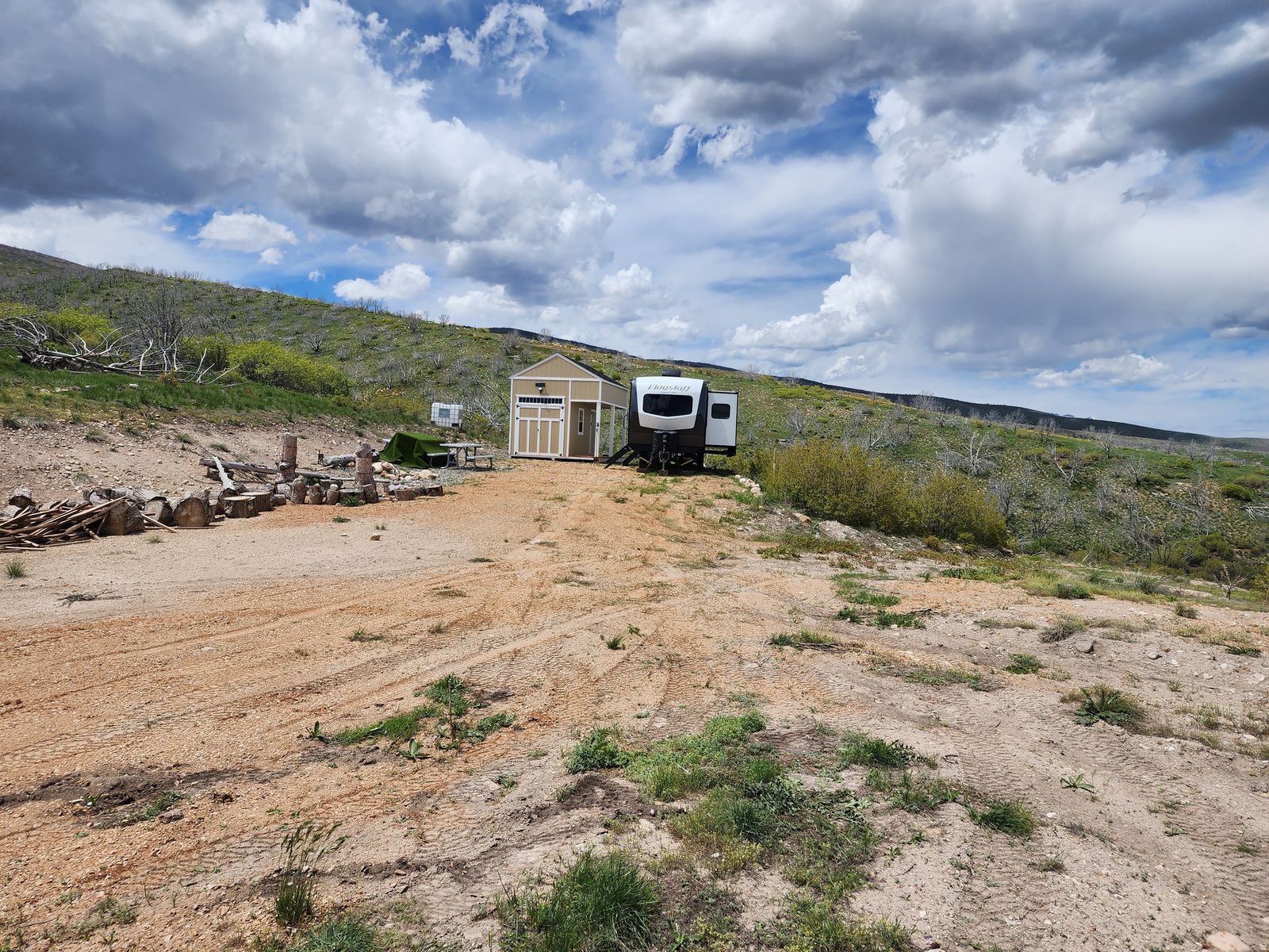 2 Indian Ridge view lots combined to make over 2 acres with large RV areas, shed with loft, and septic system installed