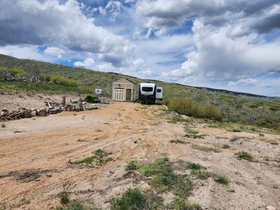 2 Indian Ridge view lots combined to make over 2 acres with large RV areas, shed with loft, and septic system installed