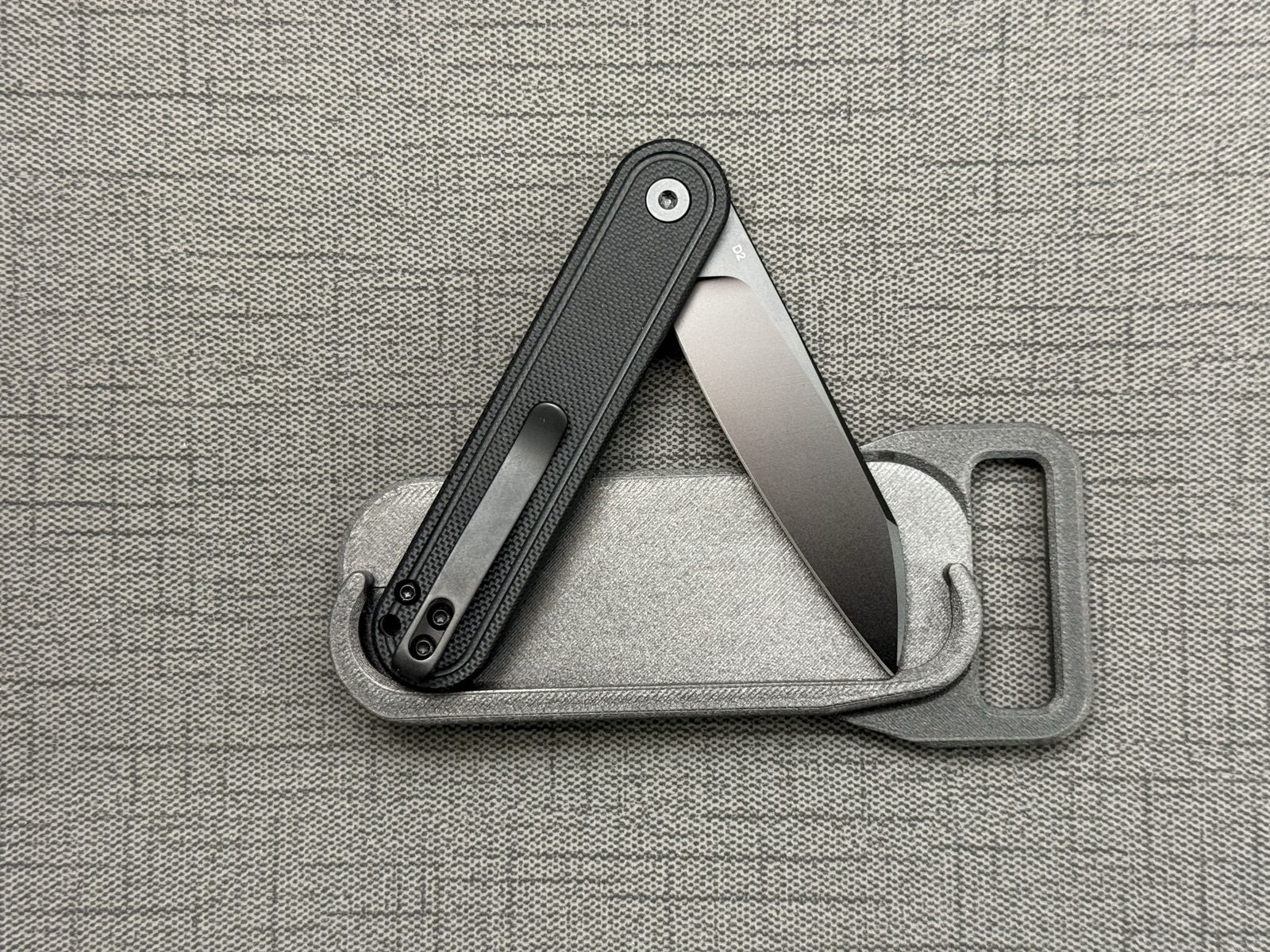 Belt buckle knife
