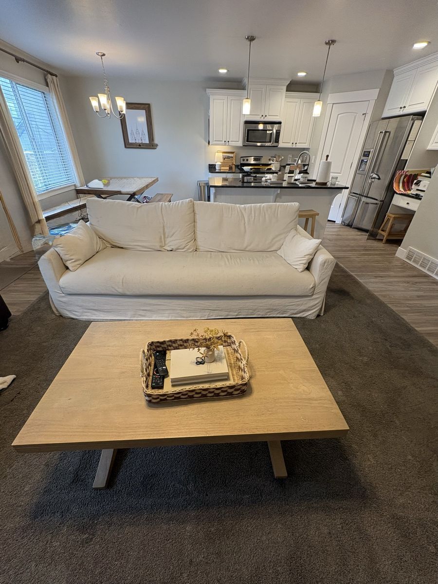 Spacious Cream Slipcover Sofa - Comfort & Style for Your Living Space