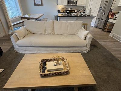Spacious Cream Slipcover Sofa - Comfort & Style for Your Living Space