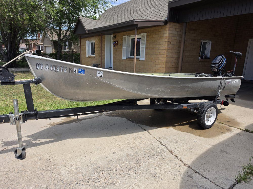 13.5 aluminum boat with mercury 7.5
