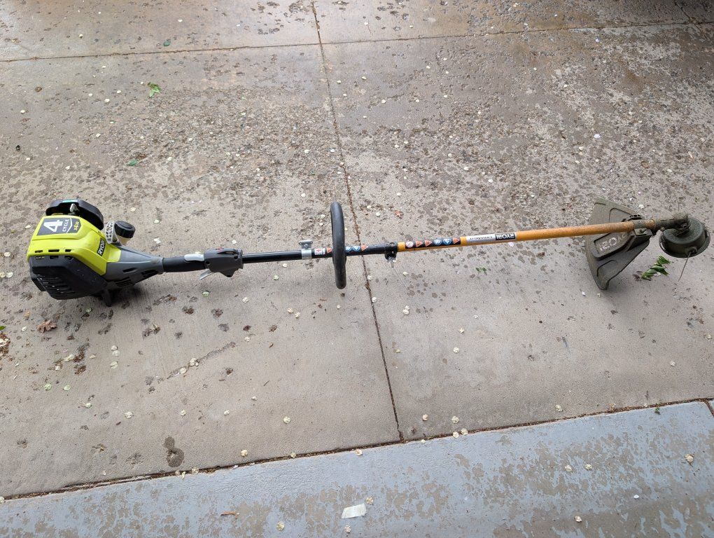 Used Ryobi 4 cycle gas trimmer x430