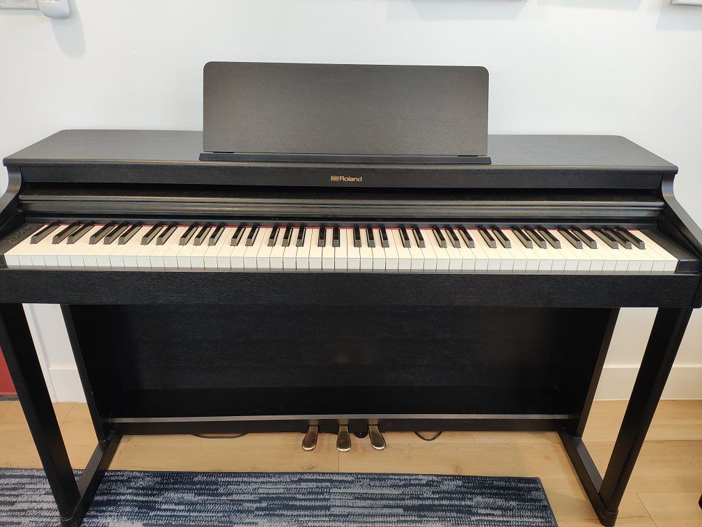 Roland RP102 Digital Piano w/ 88 Weighted Keys & Bluetooth Connectivity, Black