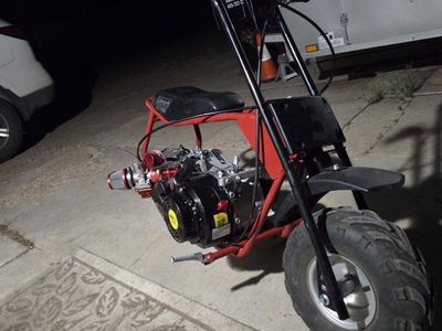 Coleman CC100X Mini Bike swapped with a 274cc and pwk carb all brand new only needs a rear sprocket like 20 bucks on Amazon