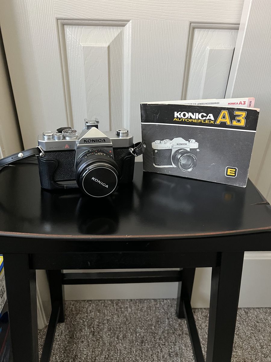Konica Autoreflex A3 35mm Film Camera with Hexanon AR 50mm f/1.7 Lens, Case, and Manual