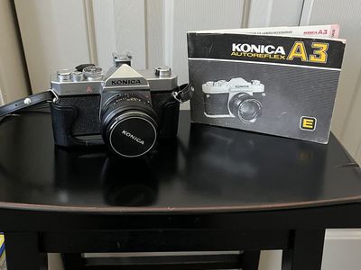 Konica Autoreflex A3 35mm Film Camera with Hexanon AR 50mm f/1.7 Lens, Case, and Manual