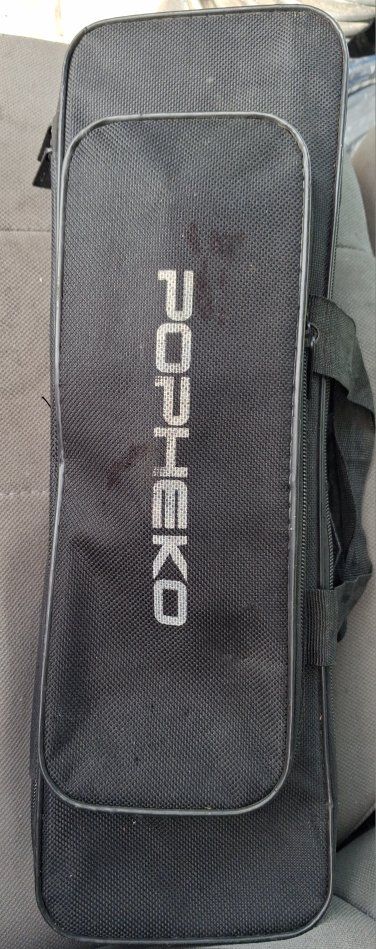 Telescopic Fishing Pole with Case and Tackle.