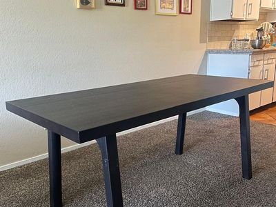 IKEA Black Wood Dining Table - Modern & Sturdy, Great Condition, Seats 4-6