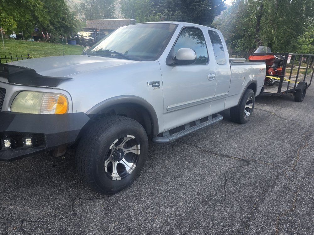 2002 rebuilt motor & transmission 
Ford F-150 Pickup Truck - Custom Bumper, Light Bar, Tow Package
