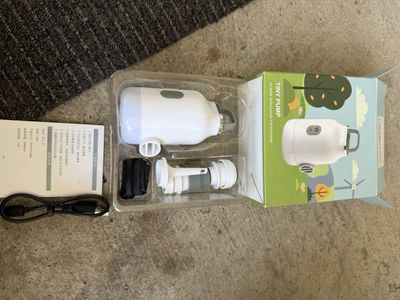 Portable Ultra-Mini Rechargeable Air Pump with Light and Nozzles