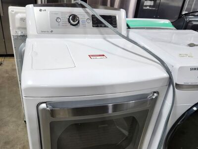 NICE LG TOPLOAD WASHER! WITH A FULL WARRANTY
