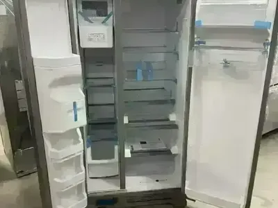 NEW WHIRLPOOL 33 INCH WIDE STAINLESS SIDE BY SIDE