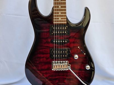 Ibanez GRX70QA – Transparent Red Burst w/ case