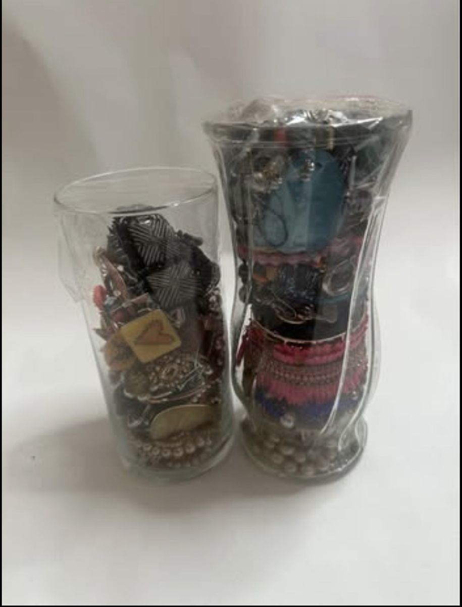 Two jars of costume/junk jewelry.