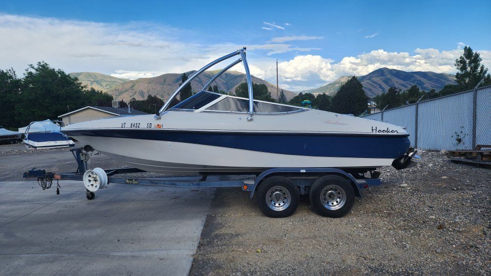 1996 Milan Ski Boat with Wakeboard Tower, 5.7L V8 Mercuiser Engine, and Trailer