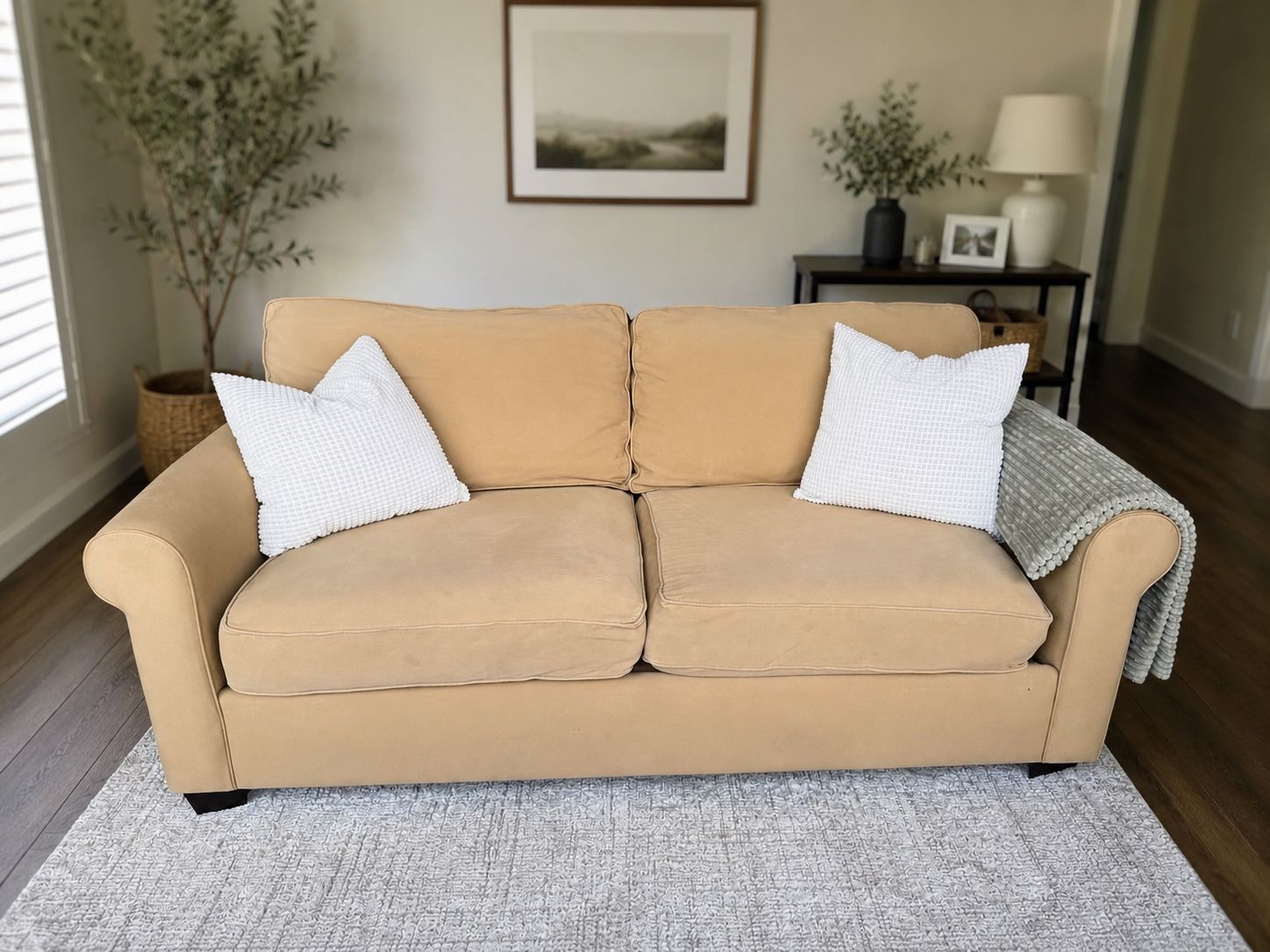 Tan love seat