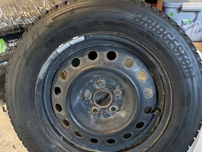 Four Bridgestone Snow Tires, mounted