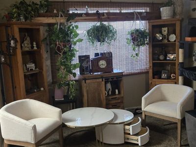 Two White Sitting Room Chairs and Round Coffee Table with Marble Top