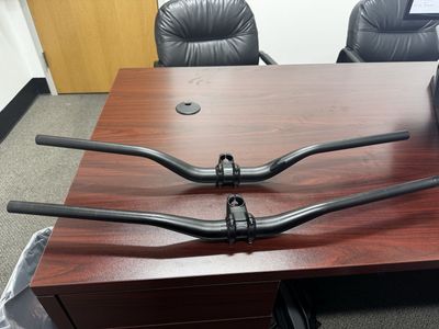 Two Specialized alloy handlebar and stem
