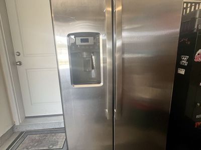 GE Profile Stainless Steel Side-by-Side Refrigerator with Ice & Water Dispenser