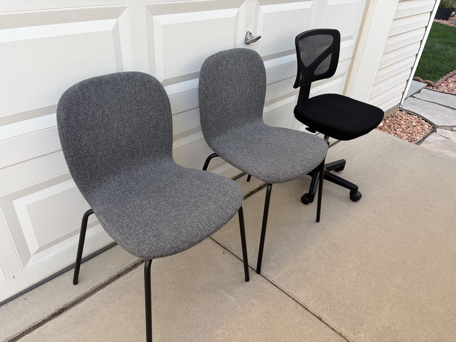 Set of Three Office Chairs - Two Gray Guest Chairs and One Black Rolling Mesh Chair