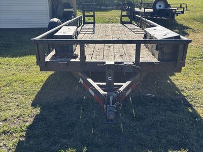 Dual Axle Flatbed Utility Trailer with Fold-Down Ramps