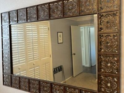 Handsome metal framed mirror