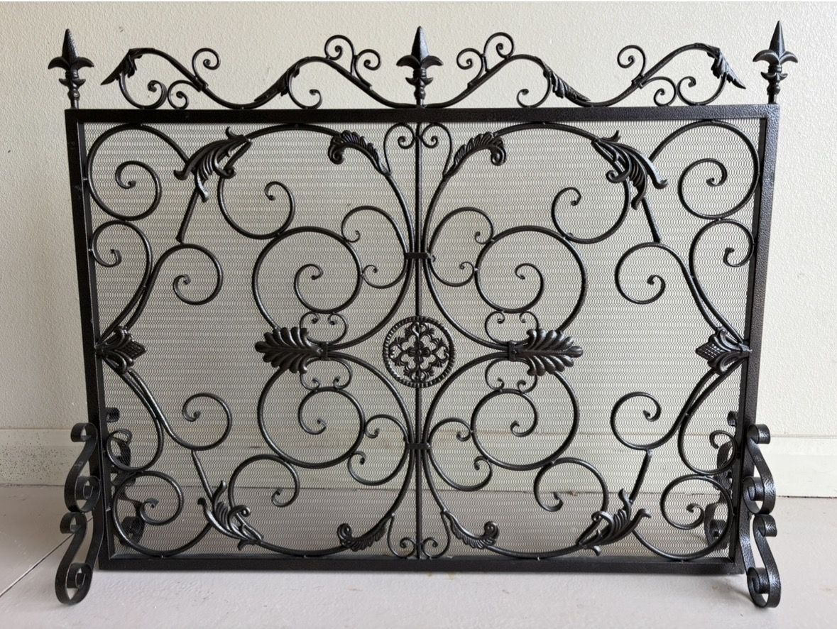 Ornate fireplace screen