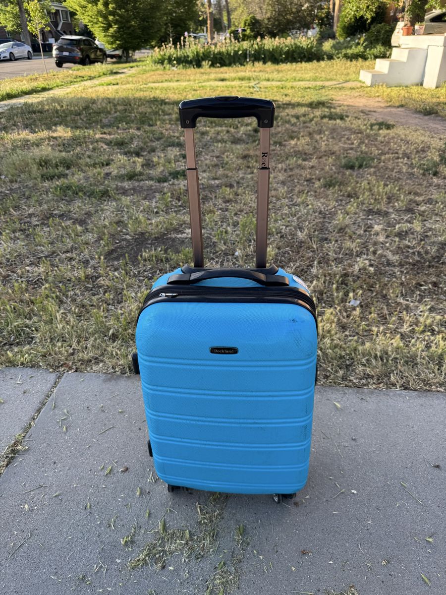 Rockland blue  hard shell carry on luggage(The price is firm)