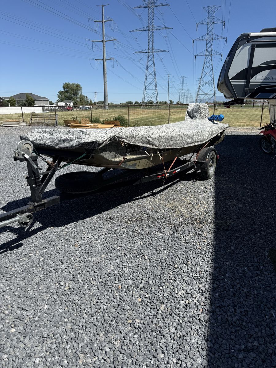 Custom Camo Duck Hunting Boat with Trailer & Mud Motor - Ready for the Water!