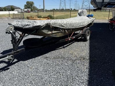 Custom Camo Duck Hunting Boat with Trailer & Mud Motor - Ready for the Water!