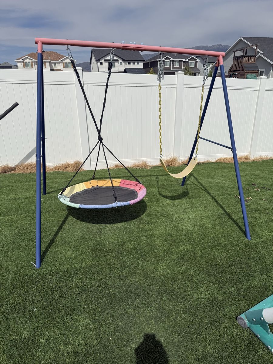 Toddler swing set frame with swing attachments