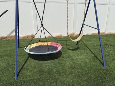 Toddler swing set frame with swing attachments