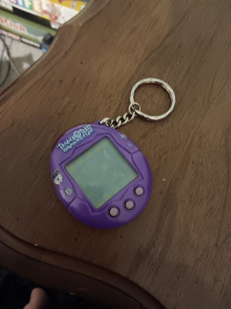 Tamagotchi Connection V2 - Solid Purple (Includes removable vintage stickers)